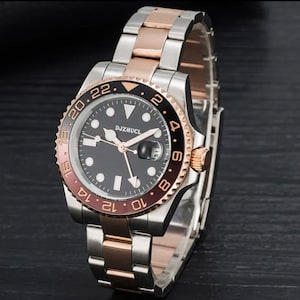 Silver and rose gold diving watch