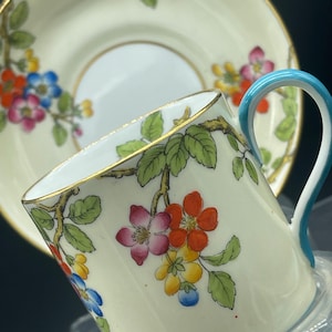 Vintage Royal Worcester Demitasse Cup and Saucer. “Martley Pattern”. 1930 Backstamp. Floral Design and Gold Trim. English Fine China.