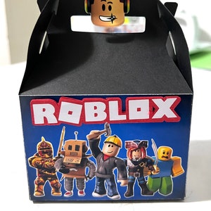 May include: A black favor box with a blue background and the word "ROBLOX" in red and white letters. The box features a variety of Roblox characters, including a knight, a robot, a construction worker, a pirate, and a yellow character with a surprised expression.