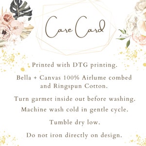 May include: Care card with instructions for washing and drying a garment. The card says "Printed with DTG printing. Bella + Canvas 100% Airlume combed and Ringspun Cotton. Turn garment inside out before washing. Machine wash cold in a gentle cycle. Tumble dry on a low heat. Do not iron directly on the design."