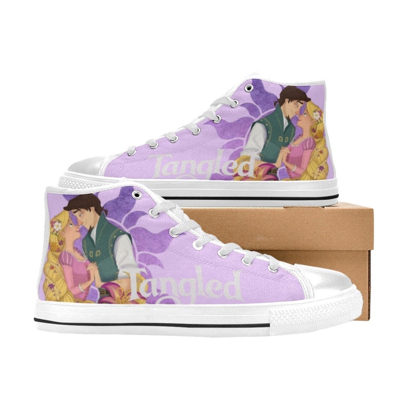 May include: Purple high-top canvas shoes with a white sole. The shoes feature a graphic of Rapunzel and Flynn Rider from the movie Tangled. The word "Tangled" is printed on the side of the shoes.