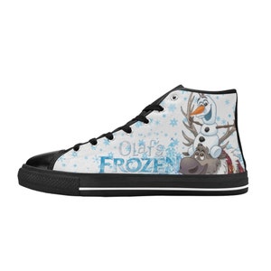May include: White high-top canvas shoes with a black sole. The shoes feature a blue and white snowflake pattern with the text "Olaf's Frozen" and a cartoon image of Olaf the snowman riding on Sven the reindeer.