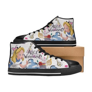 May include: Black high-top canvas sneakers with a white background and a colorful design featuring Alice in Wonderland characters, including Alice, the White Rabbit, and the Cheshire Cat. The text "Alice in Wonderland" is printed on the shoes.