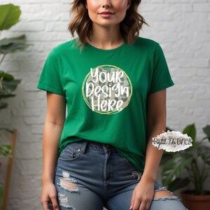 May include: A green t-shirt with a white circle and the text "Your Design Here" inside the circle. The circle has a light brown and white leopard print pattern.