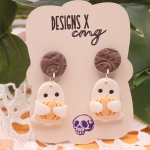 Dangle ghost earrings holding pumpkins, cute Halloween polymer clay earrings, adorable little ghost jewelry