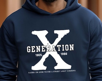 May include: A navy blue hooded sweatshirt featuring a white graphic of "GENERATION X" with the years 1965 and 1986. The text "RAISED ON HOSE WATER & STREET LIGHT CURFEWS" is below. The sweatshirt has a front pocket and a hood.