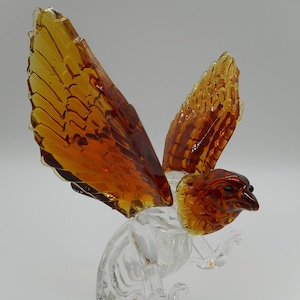 Escultura pesada em vidro Art Eagle âmbar e transparente por volta de 1980