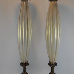 Pair of Hollywood Regency style brass Candleholders