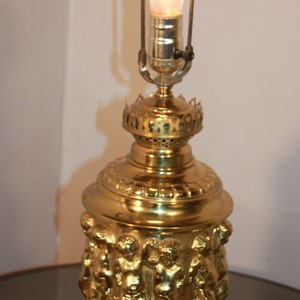 Classical Cherub embossed brass parlor Lamp electrified , CIRCA 1900s