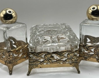 Set HOLLYWOOD REGENCY gold metal and glass trinket box vanity set CIRCA 1950s