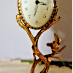 GLOBE German figural brass color metal mechanical clock CIRCA 1940s