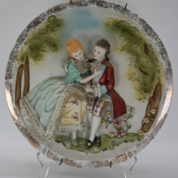 Raised Relief Lord & Lady Victorian attire decorative plate CIRCA 1960s