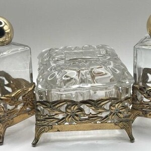 Set HOLLYWOOD REGENCY gold metal and glass trinket box vanity set CIRCA 1950s