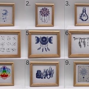 May include: Nine framed prints with various designs, including a crescent moon, a flower, a bottle, constellations, a dreamcatcher, feathers, a chakra, potion bottles, and a sun. The frames are all made of light wood.
