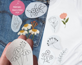 May include: The image showcases a collection of printable stick and stitch PDF designs. The designs include floral and botanical motifs, such as daisies, a butterfly, and various line art flowers. The designs are displayed on denim and a white t-shirt.