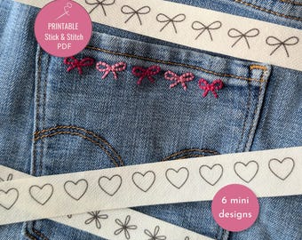 May include: Close-up of a denim pocket with embroidered pink bows. White ribbons with black bow, heart, and flower patterns are layered across the denim. A pink circle reads "Printable Stick & Stitch PDF" and another reads "6 mini designs."