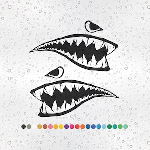 May include: Two black and white shark tooth decals with a jagged edge design. The decals are on a white background with water droplets.