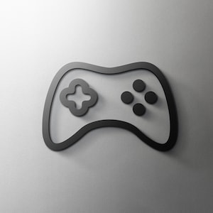 Puede incluir: Un contorno negro de un mando de videojuego con un botón en forma de cruz y cuatro botones redondos.