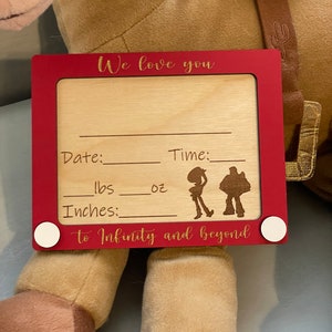 Toy themed birth stat photo prop announcement