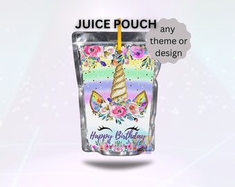 May include: A silver juice pouch with a unicorn design. The unicorn has a gold horn and a floral crown. The pouch has a rainbow background with gold glitter and the text "Happy Birthday".