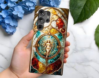 May include: A phone case with a stained glass design featuring a woman in a circle surrounded by gold and blue accents. The case has a camera cutout with three lenses.