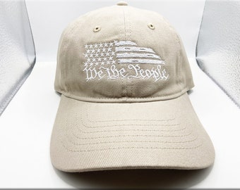 We The People with American USA Flag Embroidered in white low-profile cap
