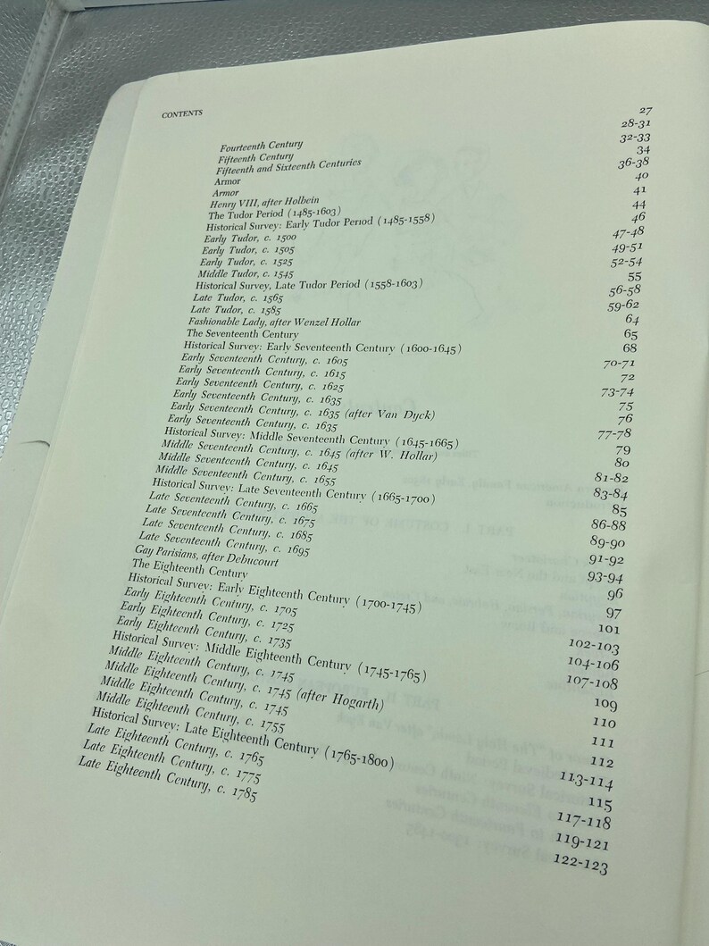 May include: Open book page with a detailed table of contents. The text lists historical periods and figures, including the Fourteenth, Fifteenth, and Seventeenth Centuries. Page numbers are visible on the right side.