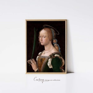 Può includere: Un dipinto di una donna con un'aureola, vestita di un abito verde e che tiene una foglia verde. Lo sfondo è scuro e il viso della donna è illuminato.