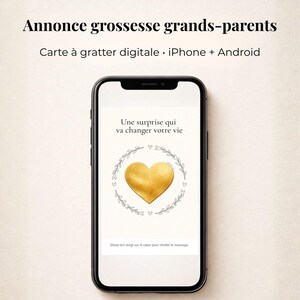 May include: A smartphone displays a digital scratch-off card with a gold heart surrounded by a floral wreath. The text on the screen reads, "A surprise that will change your life." The top of the image has the text "Announcement pregnancy grandparents."
