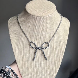Bead Bow Necklace - Grunge style beaded bow necklace with hematite and stainless steel