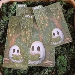 May include: Three rectangular bookmarks featuring a white ghost reading a green book under a willow tree with hanging lanterns. Each bookmark has a tab at the top with the word TODAY printed in white. The illustration uses shades of green and brown.