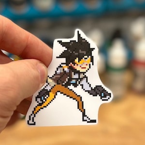 Overwatch 2 Tracer Pixel Spray Vinyl Sticker Decal, Laptop, Phone, Gaming, Hero, Notebook, Game Art, Trendy, Cool, Unique