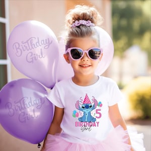 May include: A young girl wearing pink sunglasses and a white t-shirt with a cartoon character and the text "5 Birthday Girl." She is holding purple balloons that say "Birthday Girl."