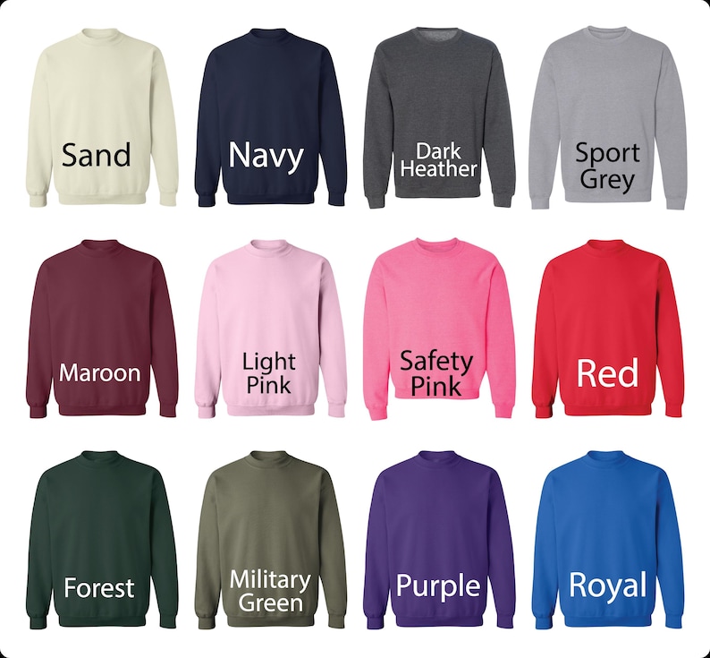May include: A collection of crewneck sweatshirts in various colors, including sand, navy, dark heather, sport grey, maroon, light pink, safety pink, red, forest, military green, purple, and royal blue. Each sweatshirt has the color name printed below it.