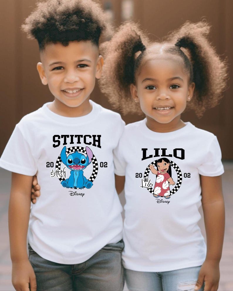 May include: Two children wearing white t-shirts with Disney's Lilo & Stitch characters. One shirt says "STITCH" with a blue Stitch graphic, the other says "LILO" with a Lilo graphic. Both shirts have a black and white checkered circle design.
