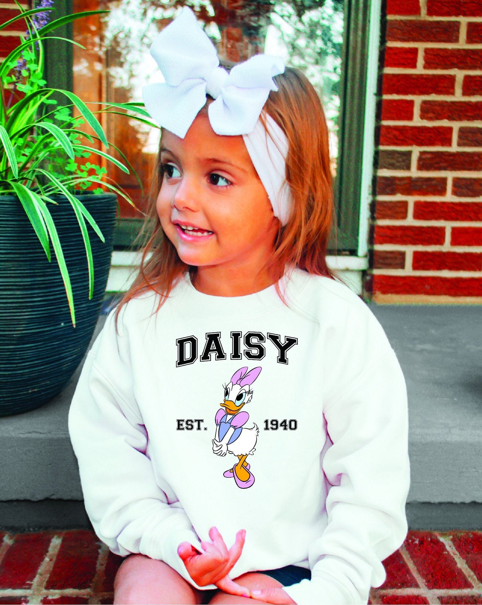 Daisy top duck sweater