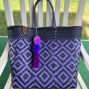 XL beach tote. Handmade plastic bag with tassel. 15/15/7in. Purple/black