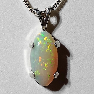 Solid All natural Australian Opal Pendant, 13.5x7.5mm. 925 Sterling Silver pendant and chain.