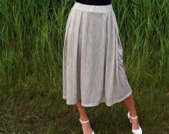 Flowy Midi Skirt, Boho Summer Style, Elastic Waist, Polyester Fabric, Golden Garden Design