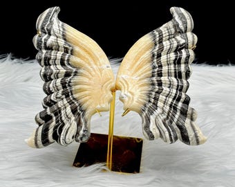 Alas de mariposa de cristal de calcita cebra sobre soporte dorado