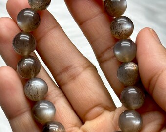 Super Rare Black Sunstone/Moonstone with Rutile Bracelet – 10mm Crystal Beads, Stretchable Cord