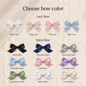 May include: A color chart titled Choose bow color displaying four lace bows in white, beige, pink, and blue, and nine satin bows in black, navy blue, silver gray, baby blue, pink, lavender, sage green, white, and cream, all arranged in rows.