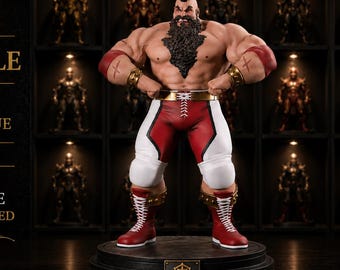 Puede incluir: Una estatua de resina premium a escala 1/8 de un luchador musculoso con barba oscura y cresta. La figura viste calzoncillos de lucha rojos y blancos, muñequeras rojas y botas rojas con cordones sobre una base circular negra con emblema.