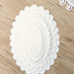 Paper oval ephemera frames for scrapbooking