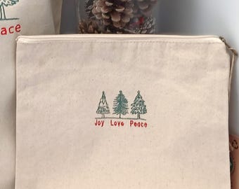 Eco Cotton Canvas Zipped Pouch Embroidered With Christmas Trees And Joy, Love, Peace. Festive Red And Green Design Has Holiday Charm. Gift