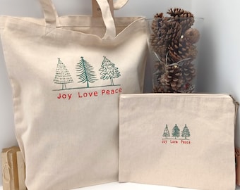 Eco Cotton Canvas Tote Bag And Zipped Pouch Set. Machine Embroidered With Green Christmas Tree And A Red Festive Joy Love Peace Message.