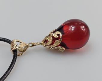 Red Baltic Amber Teardrop Pendant, Gold & Sterling Silver