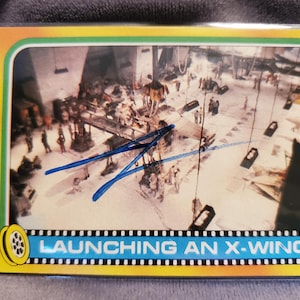 Carte originale Empire contre-attaque originale signée à la main George Lucas 1980 dédicacée par le réalisateur Burger King Coca Cola Indiana Jones