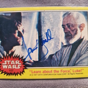Tarjeta original de Star Wars: Una nueva esperanza de 1977 firmada a mano por Mark Hamill y autografiada por Luke Skywalker y El Imperio Jedi Contraataca.