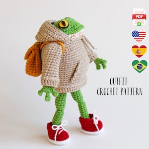 Könnte beinhalten: Häkelanleitung für einen Frosch, der einen beigen Hoodie, einen braunen Rucksack und rote Turnschuhe trägt. Das Muster ist im PDF-Format verfügbar und enthält Anweisungen in Englisch, Spanisch, Portugiesisch und Französisch.
